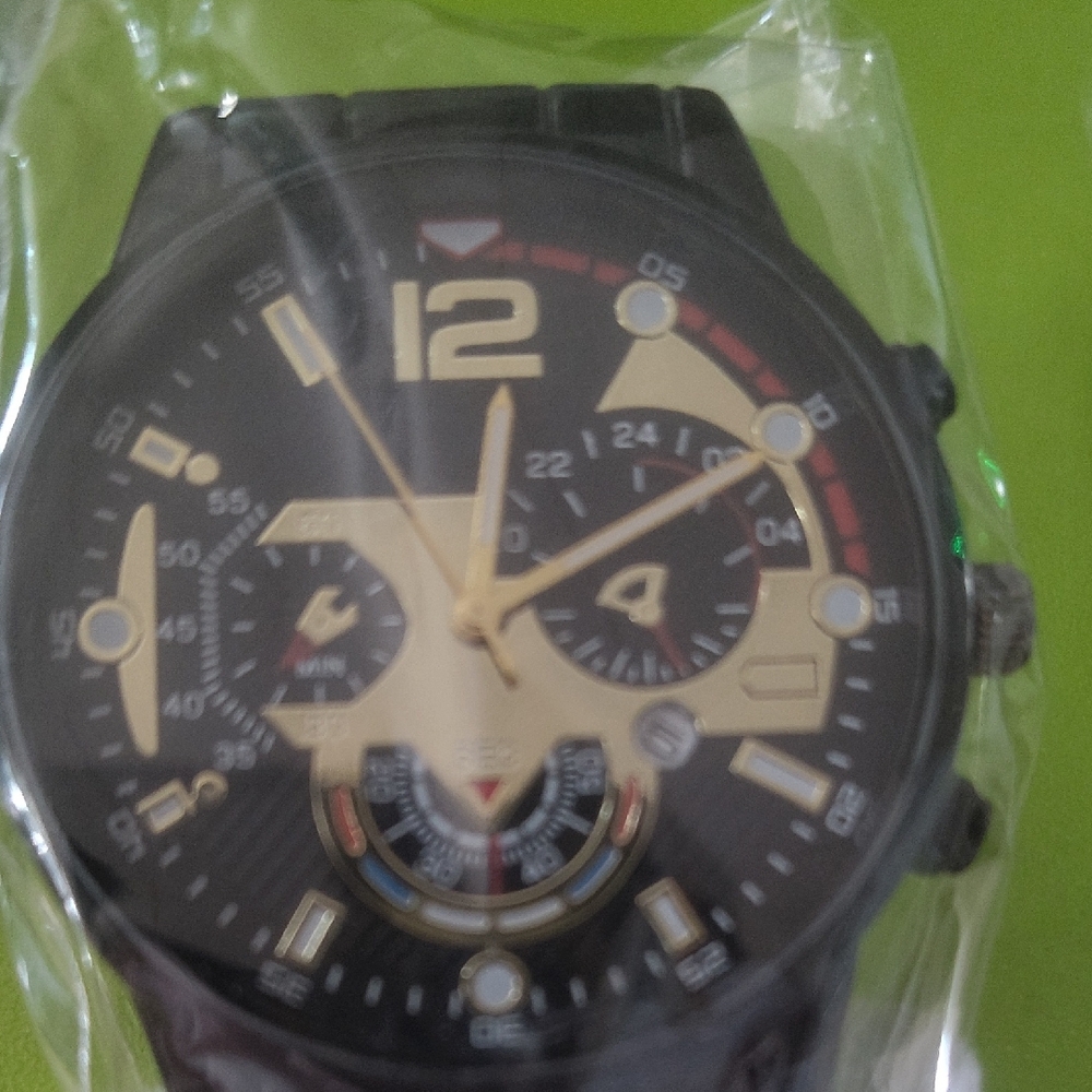 Black and Gold Analog Watch
